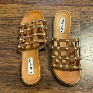 Steve Madden sandal. Brown with gold accents. Size 7.